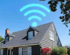 A modern New Zealand home from the outside, with strong mobile signal reception symbolising improved indoor connectivity using a cell phone signal booster.